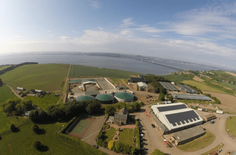 Birds eye view of Peacehill Farm, farmland and river in background