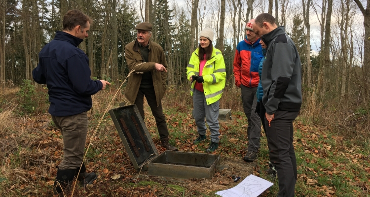 Inspecting the water holding tank at Whittinghame